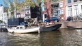 Views Of Houseboats Of Amsterdam In Sunny Day