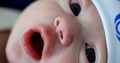 Newborn Close-Up Face Macro In First Minutes Of Life