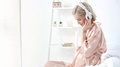 Cheerful Blonde Pregnant Woman Listening Music