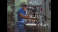 1980s: United States: Astronaut Works With Protein Crystal Growth In