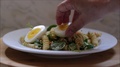 Chef Assembles Cold Spinach, Pasta Salad With Hard Boiled Eggs And Ranch
