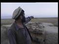 Afghanistan: Northern Alliance Fighters On Frontline Watch U.S-Led Bombar.