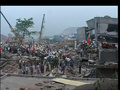 China: Hu Jinato Visits Quake Survivors; Factory Worker Is Rescued After 1.