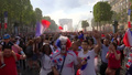 Raucous Fans Celebrate French Victory On Champs Elysees In Paris