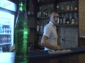 Barman Serving A Cold Sprite