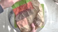 Opening Burgerking's Take Out Paper Bag On A Wooden Plate And Taking