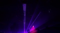 Violet Laser Beam. Dancing People At A Party. Laser Show Background