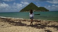 Pond5 A model enjoying a walk along the caribbean beach levera, grenada with an