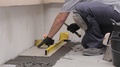 Laying Ceramic Tiles With Cement Adhesive, Yellow Level.