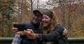 Smiling Happy Couple Outside In The Autumn Sharing Their Selfie On Social Media
