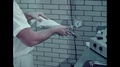 1960s: United States: Man Tests Carbon Level Of Cola. Carbonation Tester.