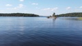 Small Island In Lake Saimaa On Warm And Windless Summer Day