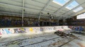 Creative Graffiti On Wall And Swimming Pool In Old Weathered Building -