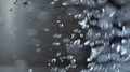 Boiling Water With Bubbles Over Dark Background
