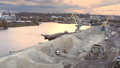 Aerial View Of Heavy Crane Loading Bulk Goods At Dnieper River Cargo Port