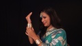 Beautiful Indian Girl With Traditional Jewellery Holding Her Wrist In