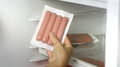 Meat Refrigerator - Female Hand Open Fridge And Take Frankfurters Packed Wurstel