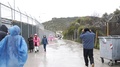 Refugees Walking In Moria Camp On A Raiiy Day In 2019