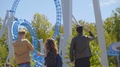 Friends Stand Near Roller Coaster, Watch How Others Ride And Look Shocked With