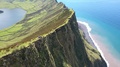 Couple On The Edge Of Steep Cliff Of Huge Caldera. Aerial Of Caldeirao Volcano