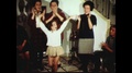 1964 - A Young Spanish Girl Dances The Flamenco While Her Relatives Clap And