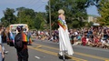 Drag Queen Wearing Stilts In Lgbtq Parade