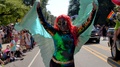 Drag Queen Wearing Wings In Lgbtq Parade