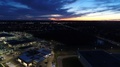 Beautiful Golden Orange Blue Sunset At Night While Flying Drone Aerial Over