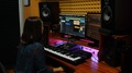 Female Songwriter Mixing And Mastering At Digital Audio Workstation. Sound