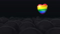 One Gay, Pride, Rainbow Heart Colour Balloon Is Flying Through Balloons. Dark
