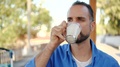 Close Up Portrait Of A Man Drinking Coffee Outdoors.