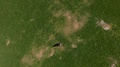 4k Aerial View Of A Man With A Hat Metal Detecting For Treasures In The