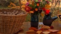 Wicker Basket With Walnuts Next To Vase Of Flowers Basket Bowl Of Red