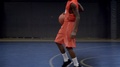 Young Male Basketball Players Playing Game Shooting The Ball And Scoring