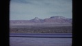 Pond5 Nevada usa-1959: film from moving vehicle of plains with mountains in the
