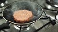 Delicious Vegan Plant Based Burger Cooking On Frying Pan Slow Motion