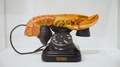 Retro Phone With Unusual Handset. Action. Black Retro Phone With Crab Shaped