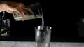 Mixologist Pouring Measurements Of Alcohol Into Cocktail Mixer, Closeup