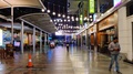 Panning Shot Of An Empty Walkway Of Cyberhub With Lights And Popular Food Joints