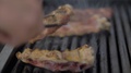 Stock Footage Hd. Cooked Beef Steak Or Pork Ribs, Toasting Meat On A Metal