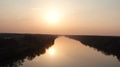 Drone Flying Over The River At Evening Sunset Time. Beautiful Nature Wild Life