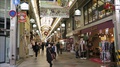 Kyoto, Japan - December 28, 2019: Shoppers In Covered Decorated Arcade