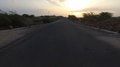 Pov Shot On Highway Countryroad At Sunset
