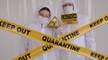 Two Doctors In The Lab In Protective Suits. Quarantine Zone. Coronavirus.