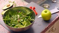 Pond5 Close up of person preparing fresh vegan salad in kitchen - 8 s