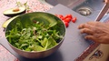 Close Up Person Preparing Fresh Vegan Salad In Kitchen - 8 S