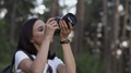 Portrait Of Travel Photographer. Beautiful Girl Takes Picture On Dslr Camera