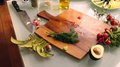 Pond5 Person preparing dime herb on wooden chopping board - 15 sec