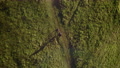Top-Down View Of The Young Athletic Man On Mtb E-Bike Pedaling.