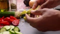Closeup Of Person Hands Preparing Vegetables For Vegan Dish - 25s